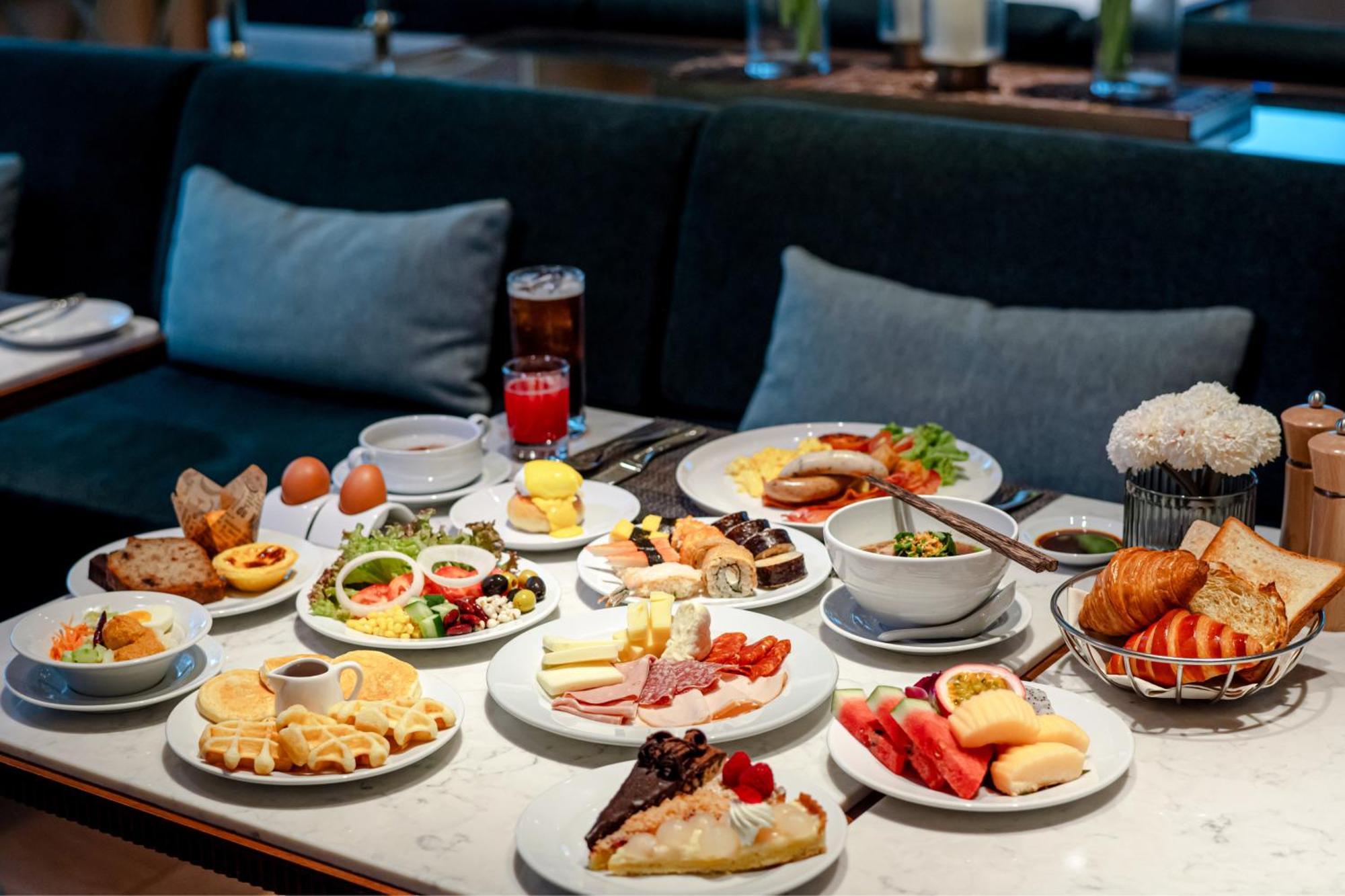 Silq Hotel & Residence Bangkok Exterior photo A selection of food at the lounge